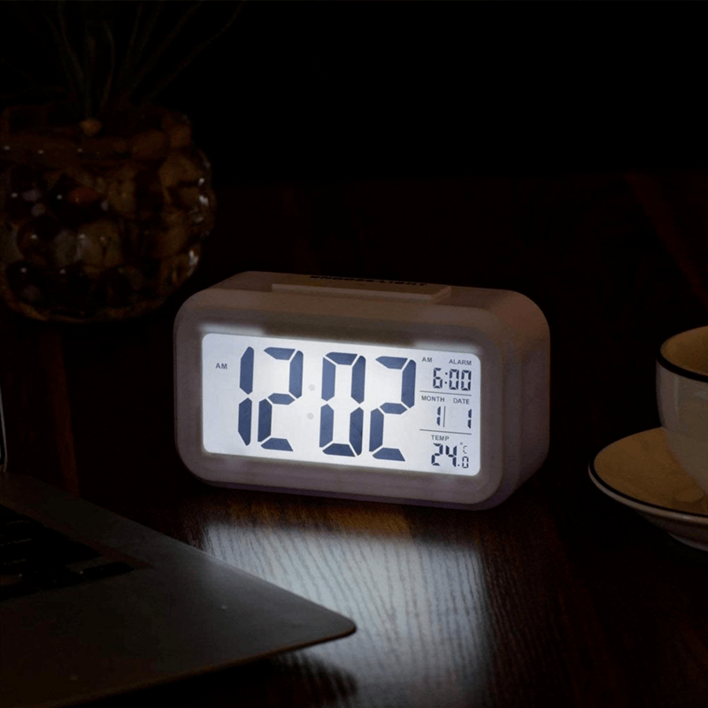 SmartAlarm Clock – Compact LCD Alarm Clock with Sound and Temperature