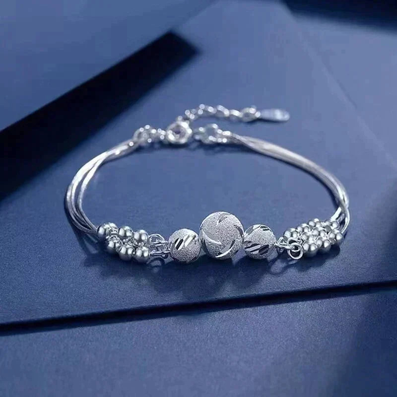 Elegant Silver Bracelet with Multiple Radiant Pearls