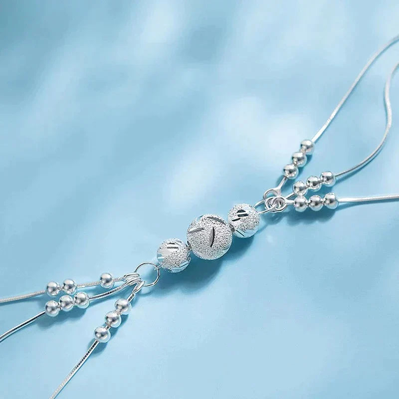 Elegant Silver Bracelet with Multiple Radiant Pearls