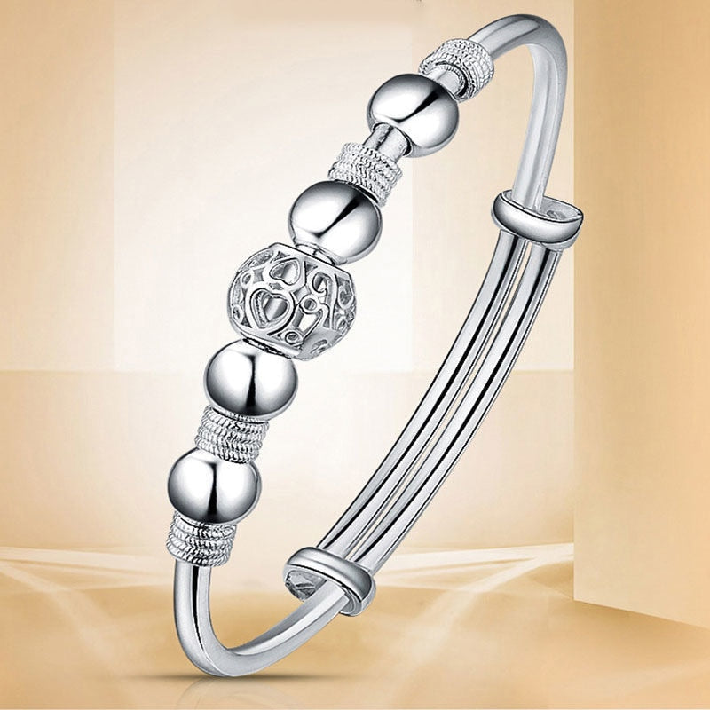 Stylish Bracelet with Captivating Silver Lucky Beads