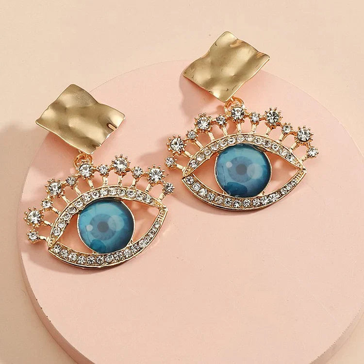 Captivating Gold Vintage Earrings with Protective Evil Eye - Nerina