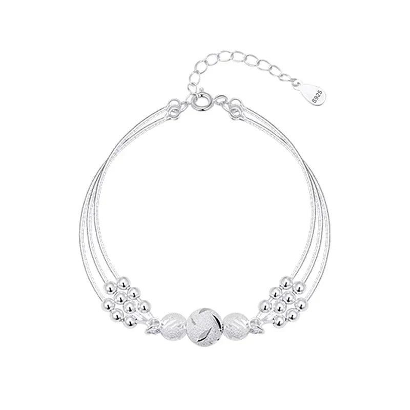 Elegant Silver Bracelet with Multiple Radiant Pearls
