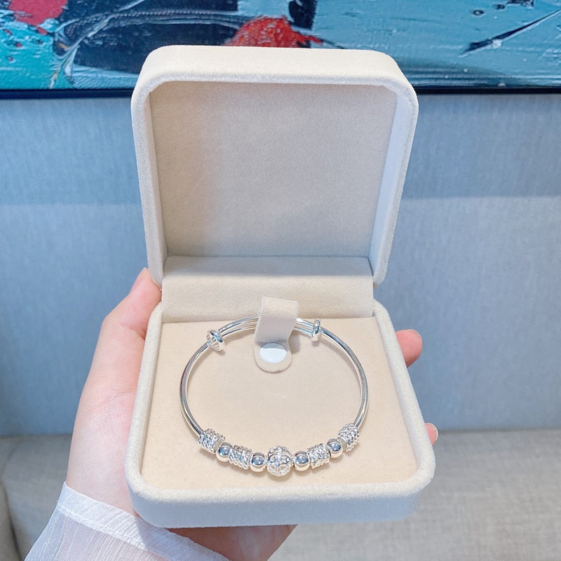 Stylish Bracelet with Captivating Silver Lucky Beads