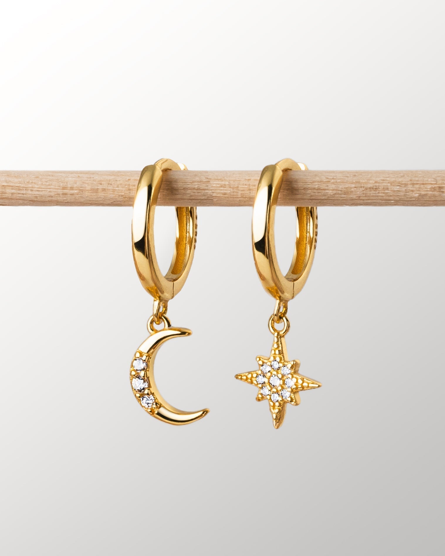 Captivating Moon and Star Earrings - Cosmica