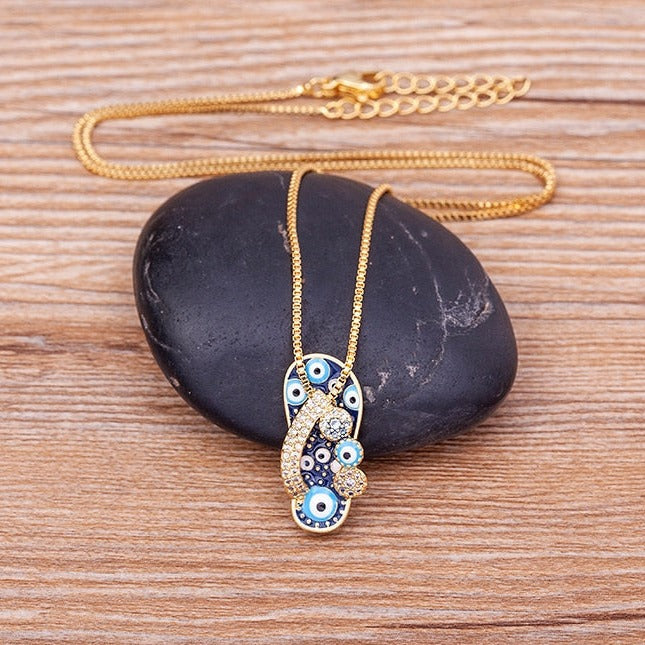Tempting Gold Necklace with Flip Flop Pendant and Protective Evil Eye - Selma