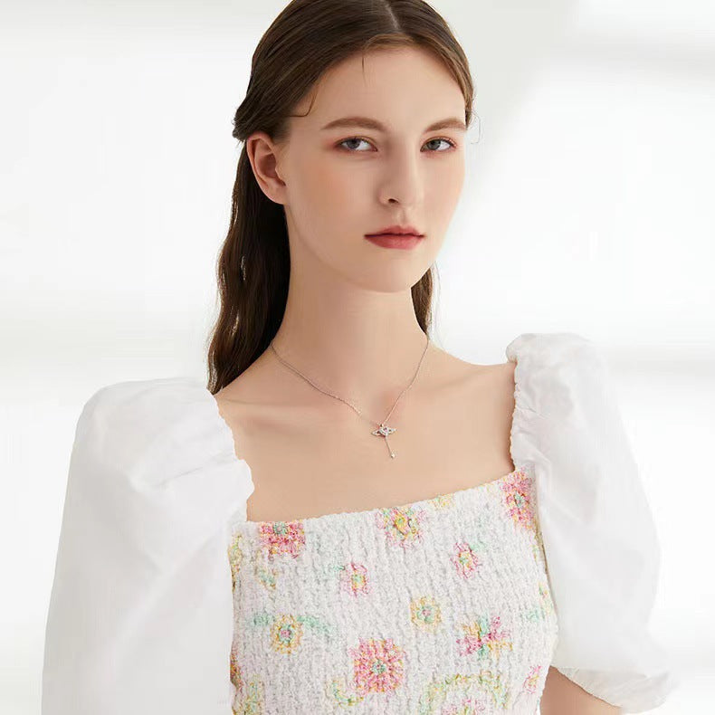 Livia Necklace - Elegant Angel Wing Pendant