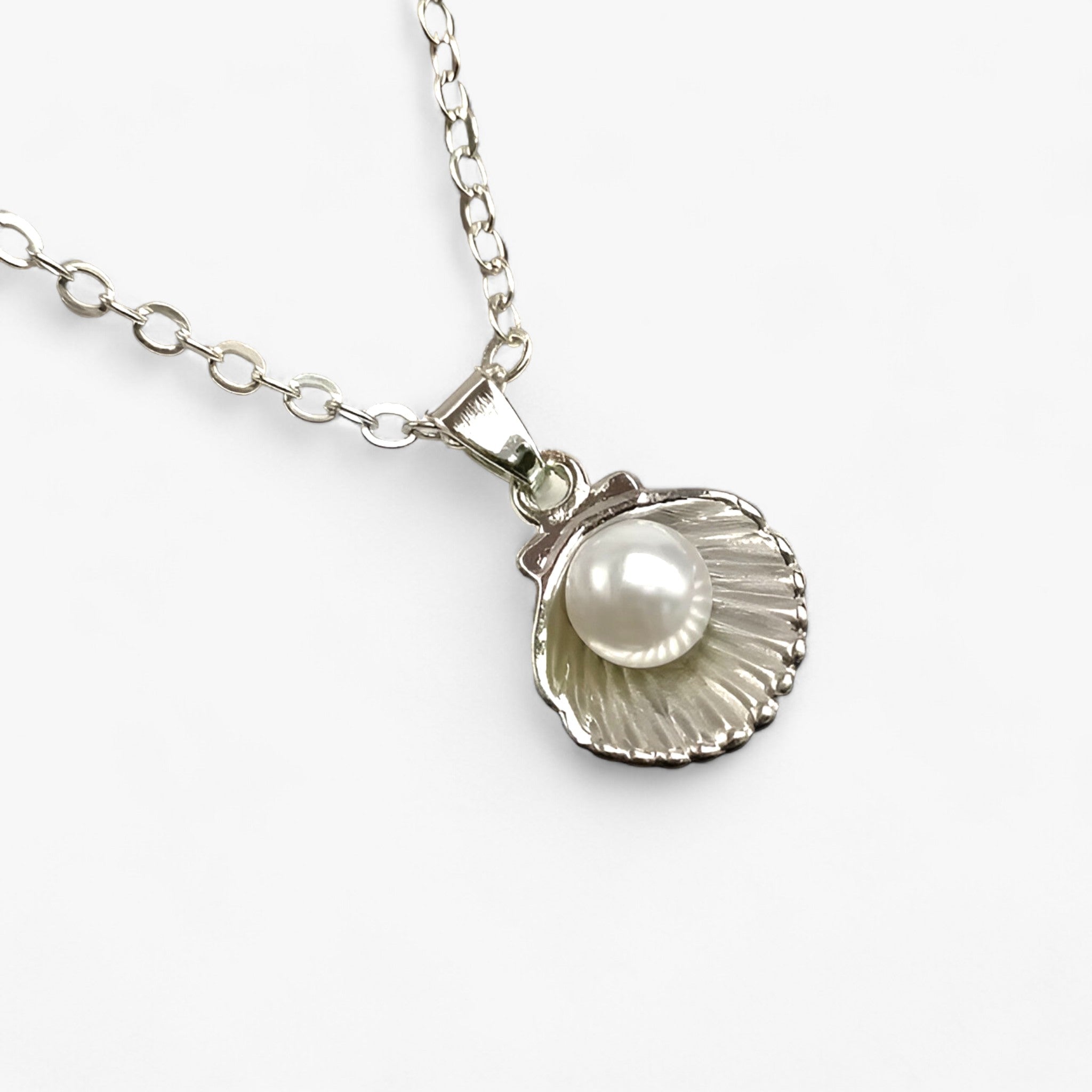 Maris - Elegant Shell and Pearl Jewelry