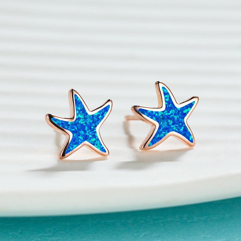 Marina's stunning blue opal starfish earrings
