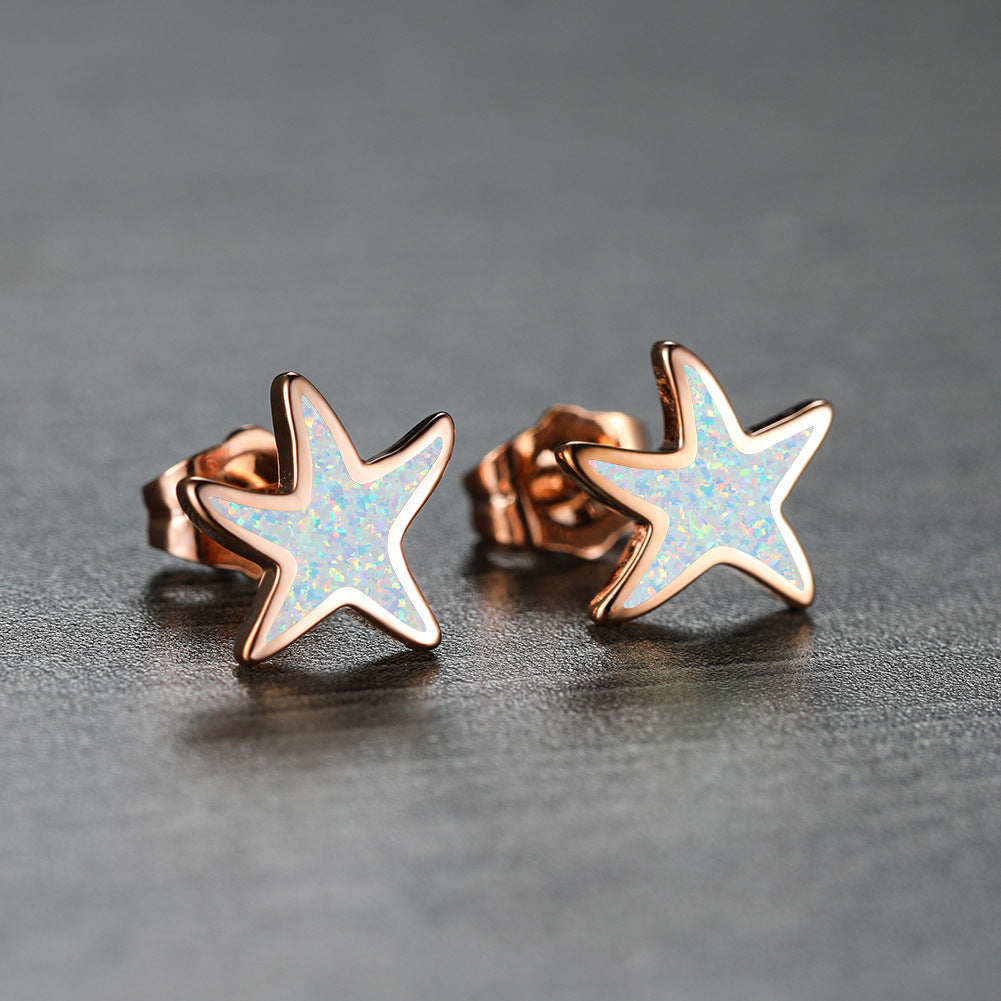 Marina's stunning blue opal starfish earrings