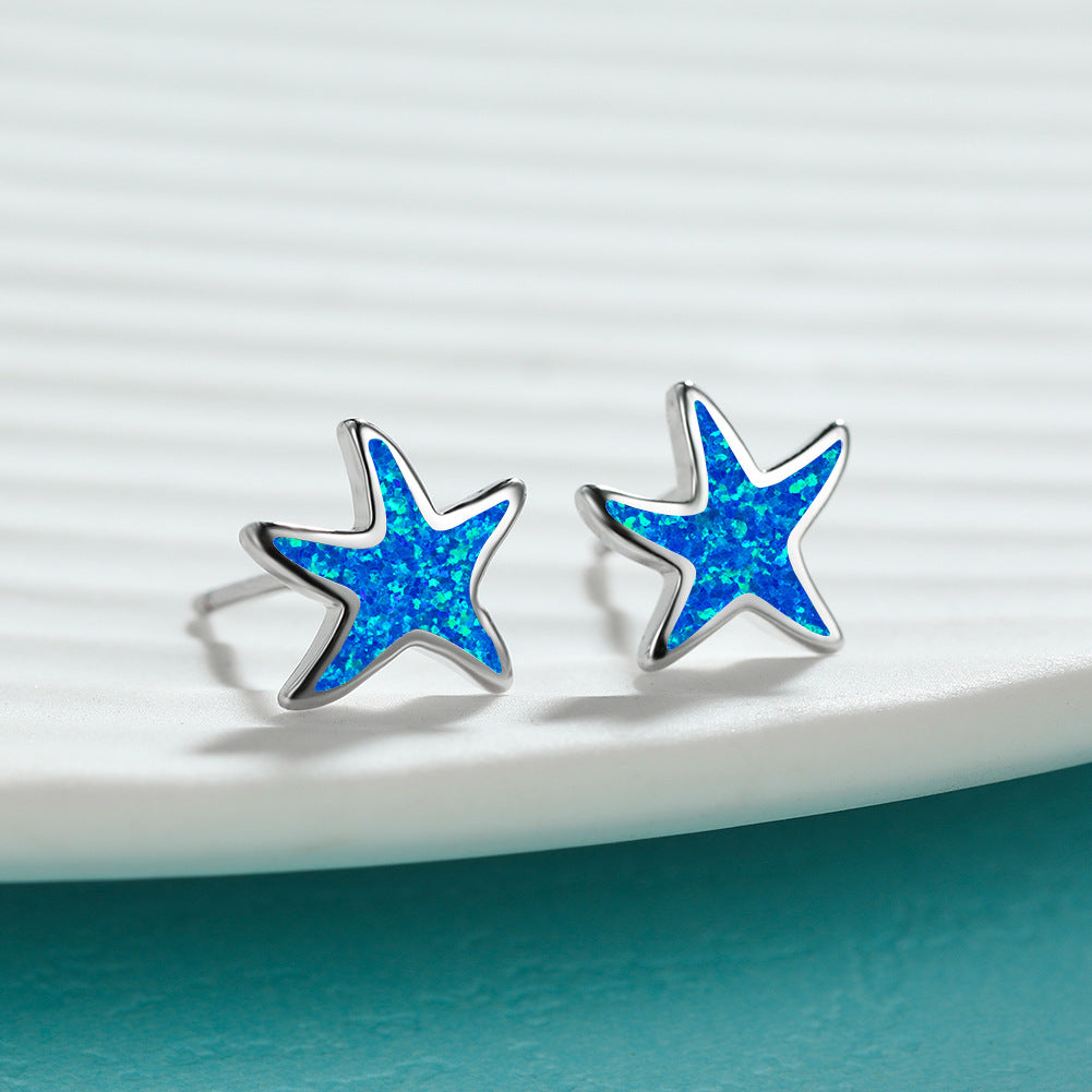 Marina's stunning blue opal starfish earrings