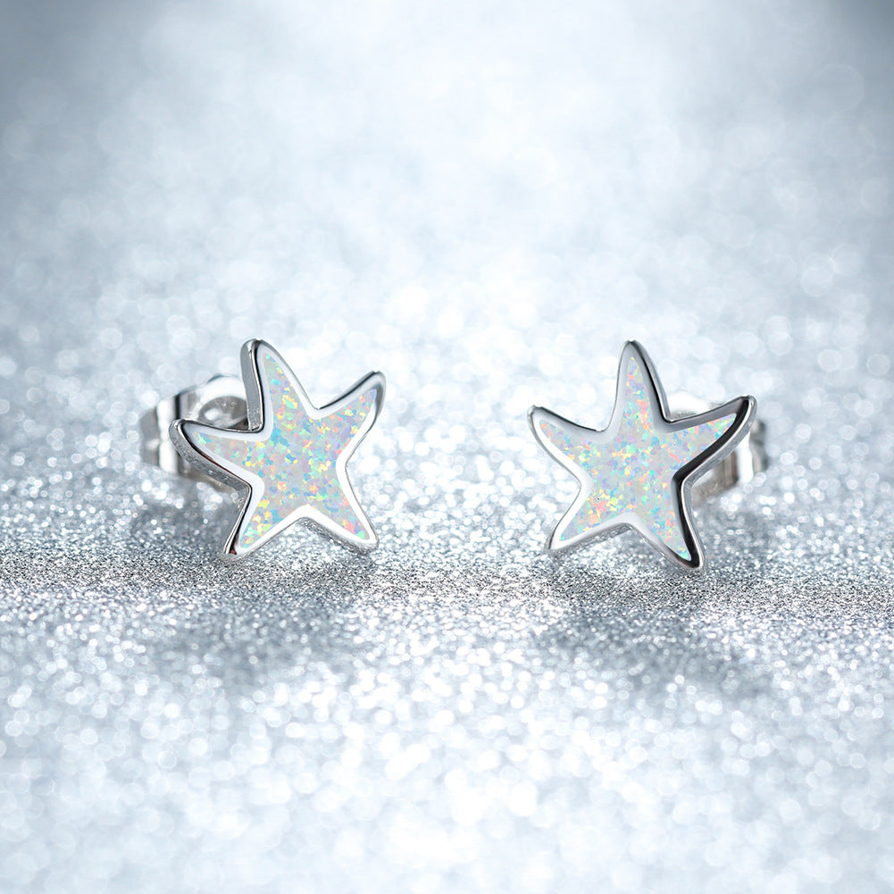 Marina's stunning blue opal starfish earrings