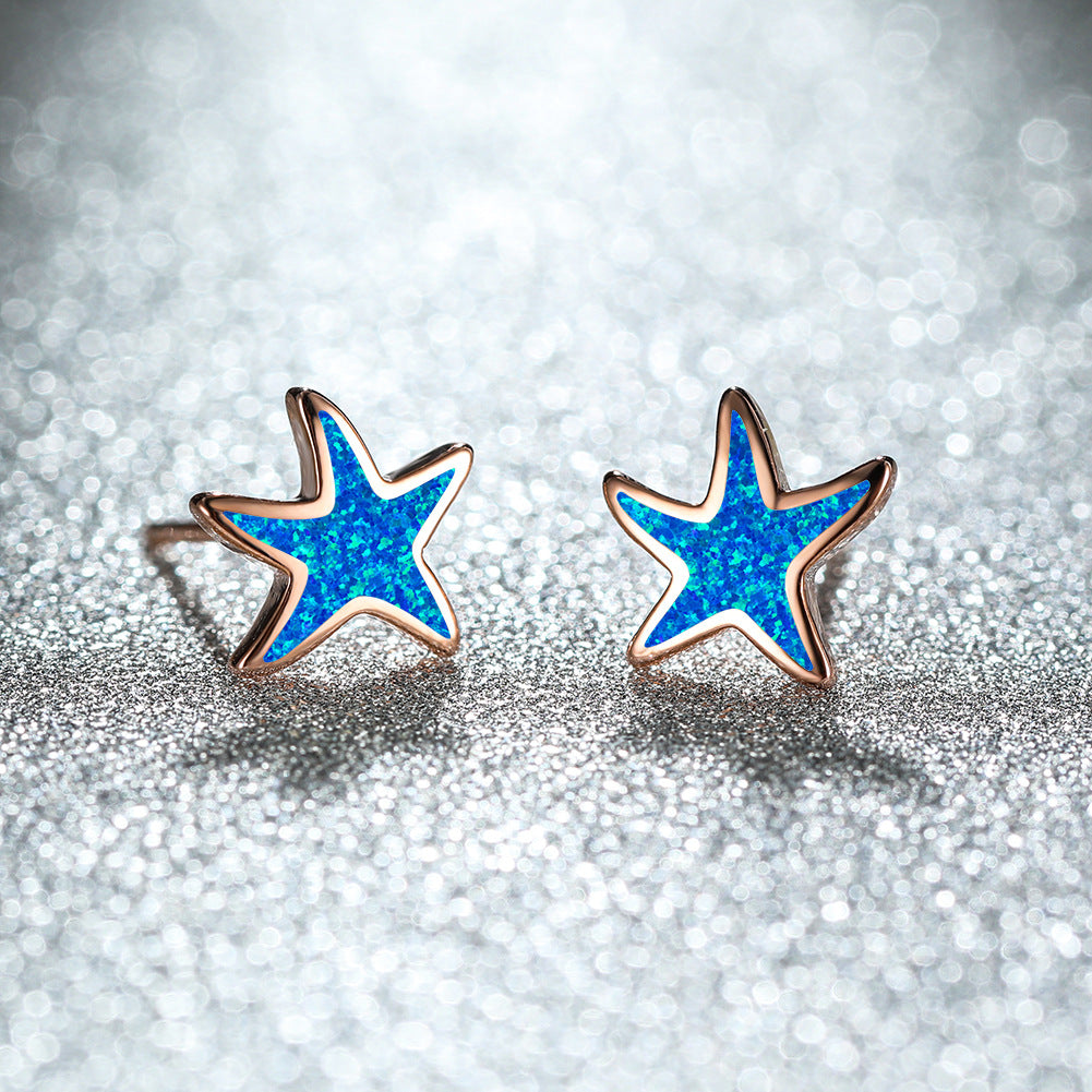 Marina's stunning blue opal starfish earrings