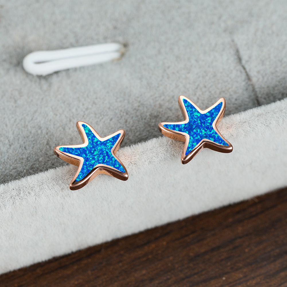 Marina's stunning blue opal starfish earrings