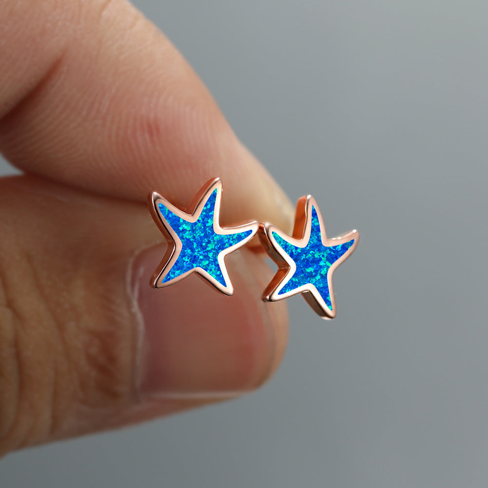 Marina's stunning blue opal starfish earrings