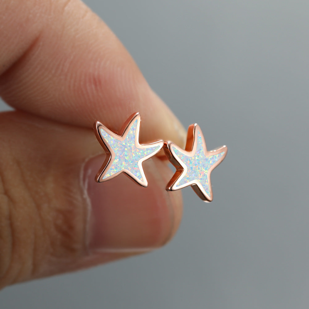 Marina's stunning blue opal starfish earrings