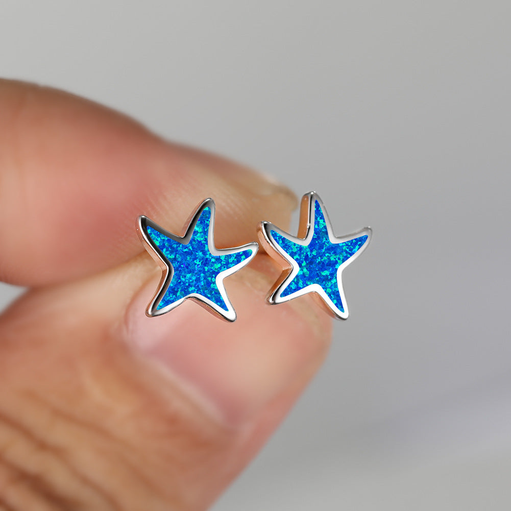 Marina's stunning blue opal starfish earrings