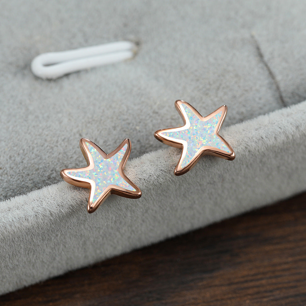 Marina's stunning blue opal starfish earrings