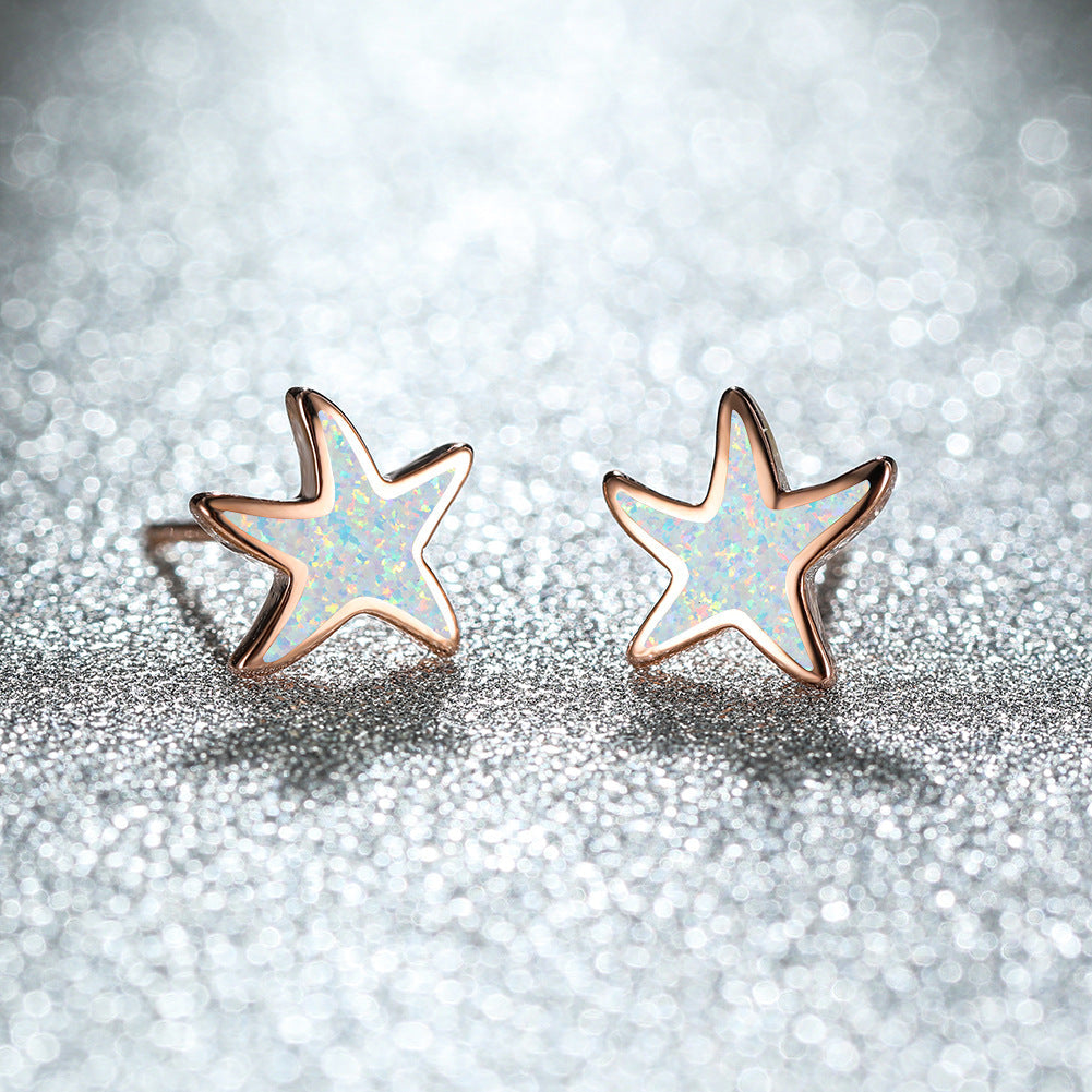 Marina's stunning blue opal starfish earrings