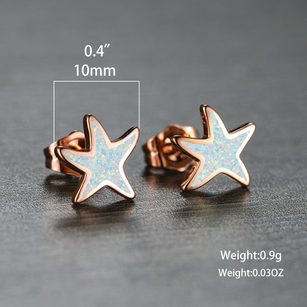 Marina's stunning blue opal starfish earrings