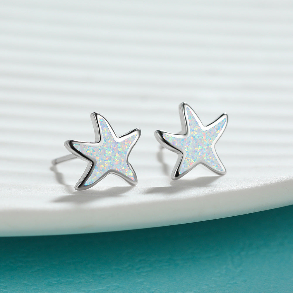 Marina's stunning blue opal starfish earrings