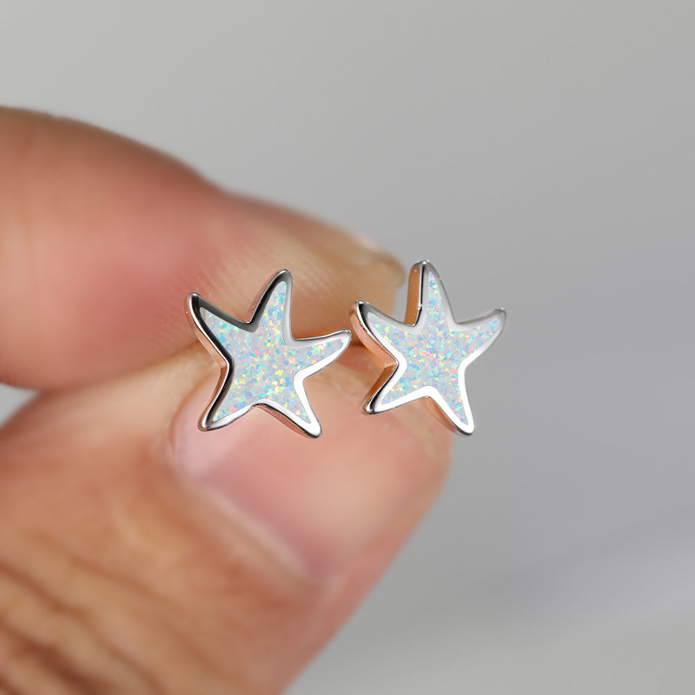 Marina's stunning blue opal starfish earrings