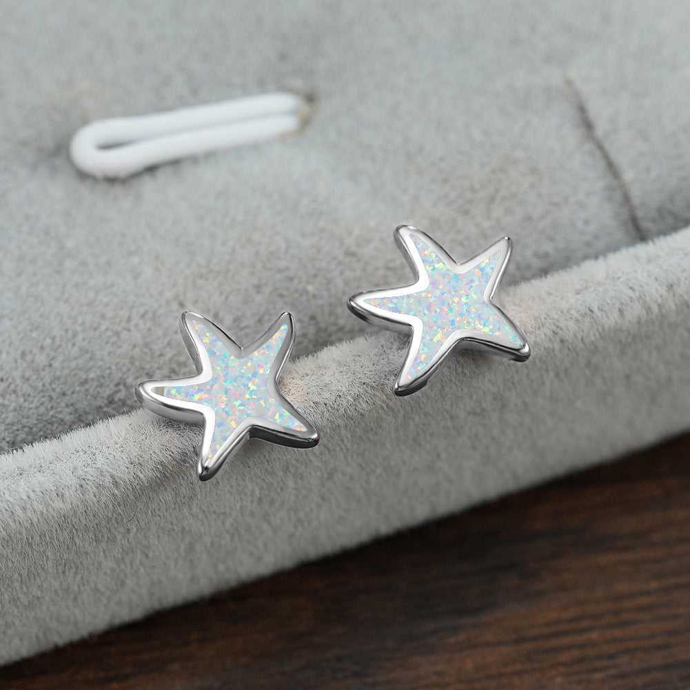 Marina's stunning blue opal starfish earrings