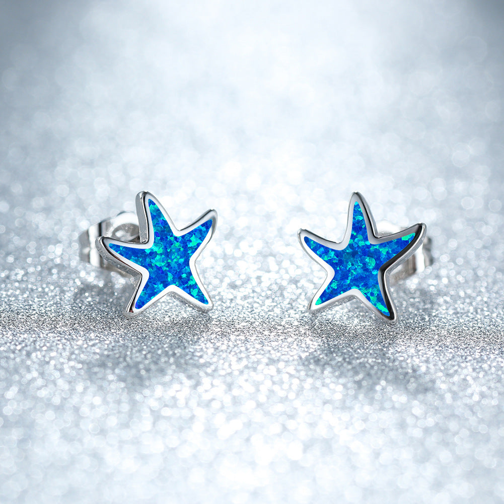 Marina's stunning blue opal starfish earrings