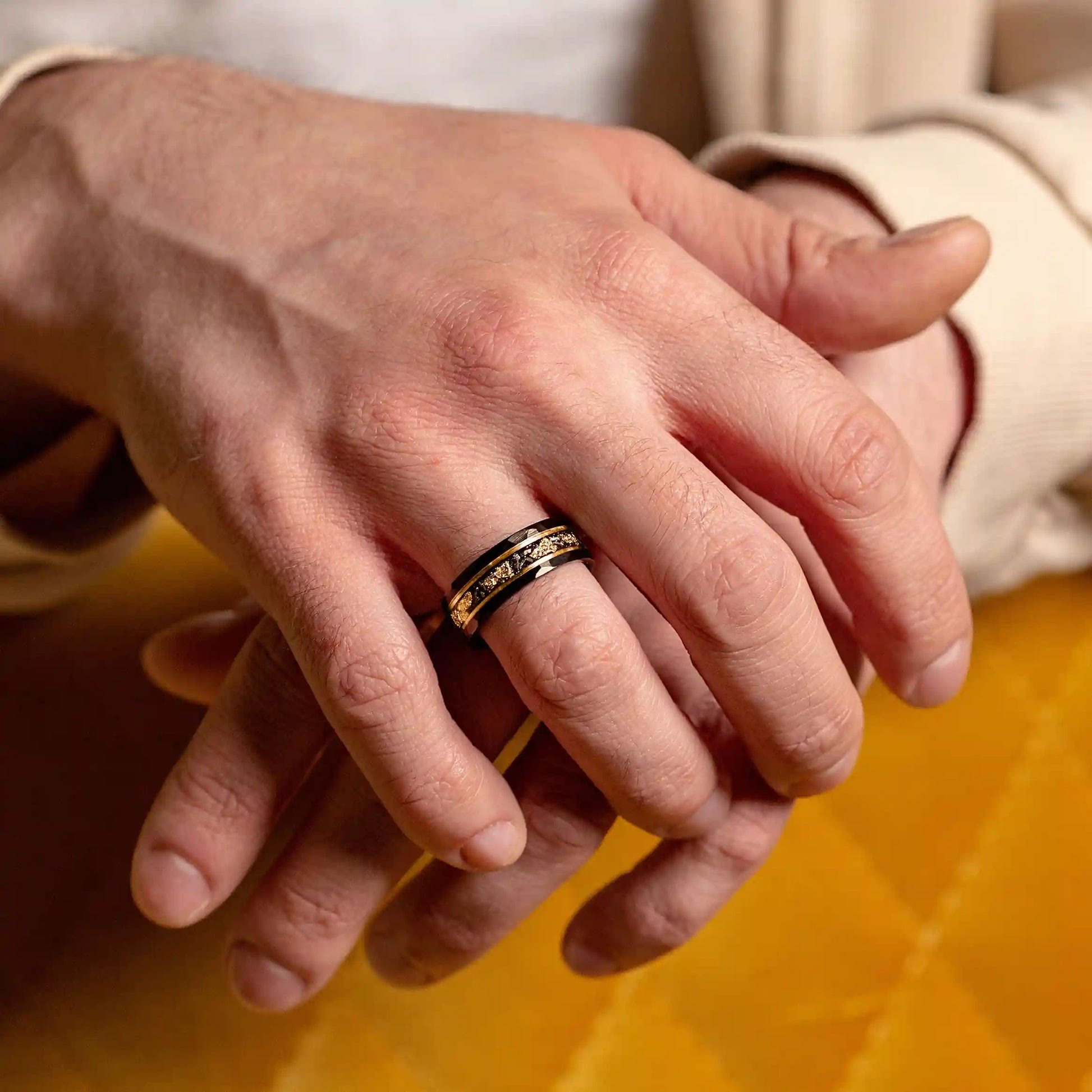 Elegant Orion Ring in Black Meteorite with Luxurious Gold Leaf Details
