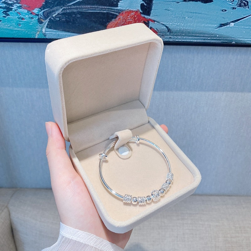 Stylish Bracelet with Captivating Silver Lucky Beads