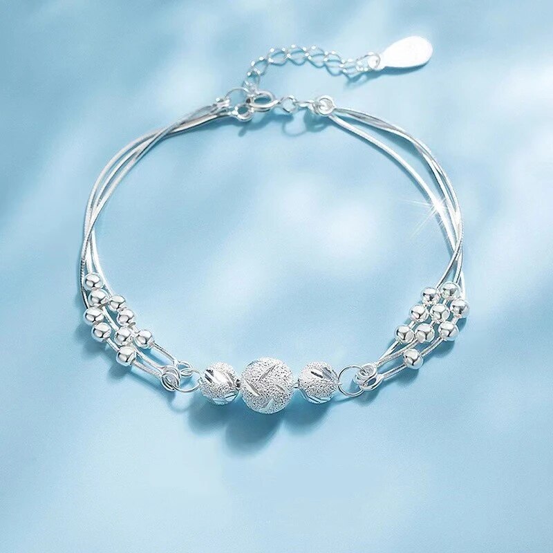 Elegant Silver Bracelet with Multiple Radiant Pearls