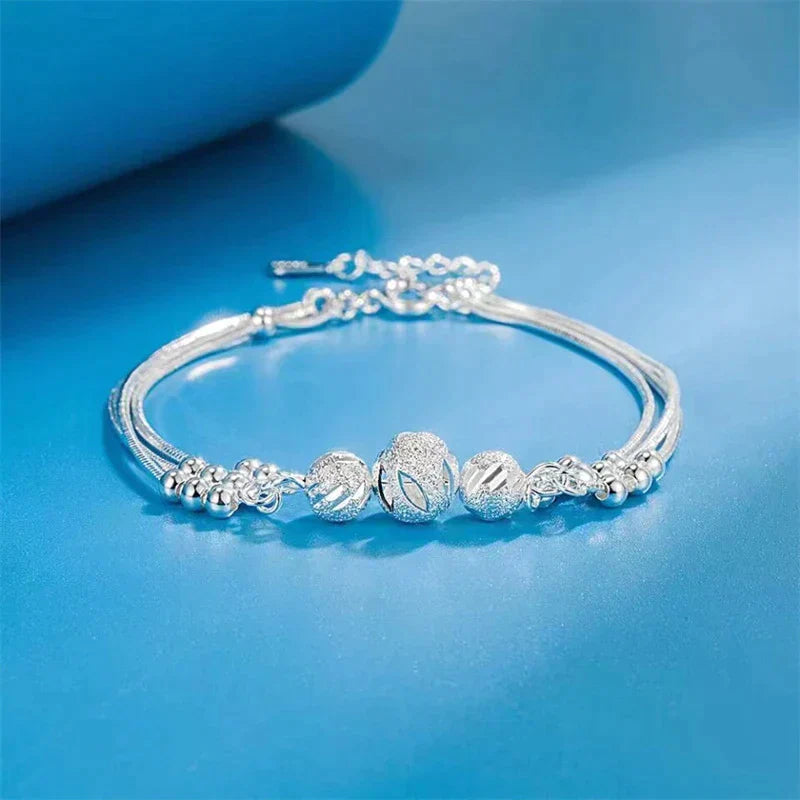 Elegant Silver Bracelet with Multiple Radiant Pearls
