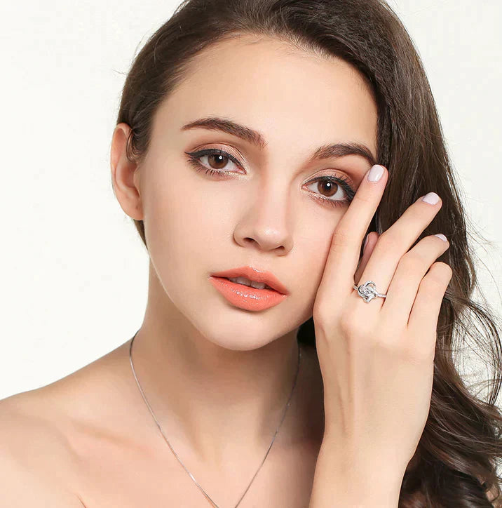 Pamper your loved one with our Enchanting Love Knot Ring - the Perfect Gift!