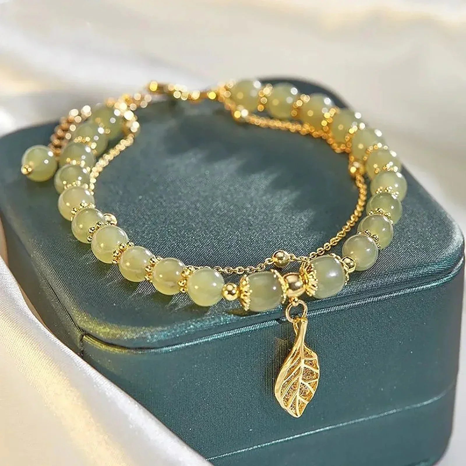 Elegant jade leaf bracelet with special leaf charm