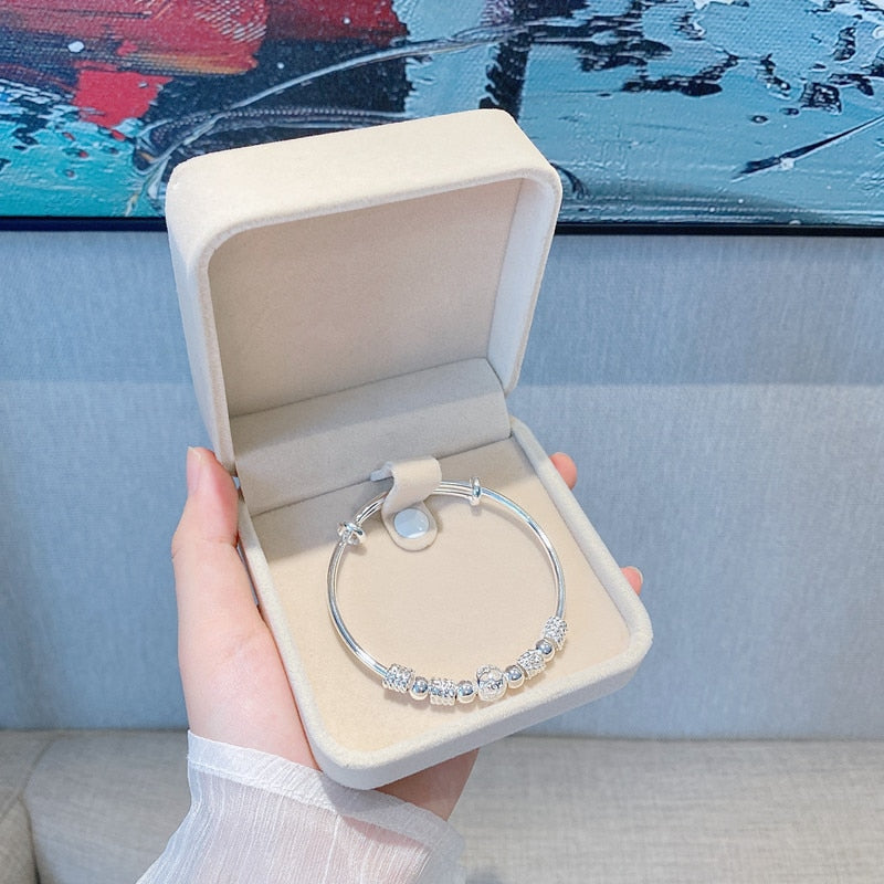 Stylish Bracelet with Captivating Silver Lucky Beads