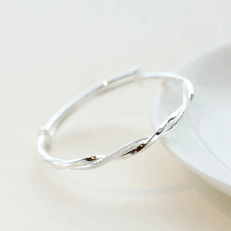 Elegant twisted silver bracelet 
