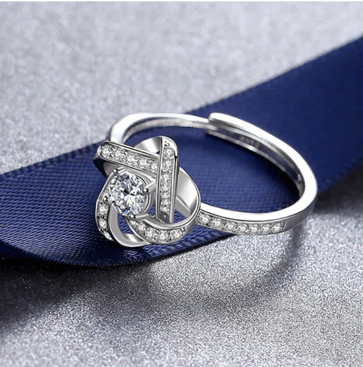 Pamper your loved one with our Enchanting Love Knot Ring - the Perfect Gift!