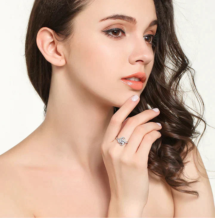 Pamper your loved one with our Enchanting Love Knot Ring - the Perfect Gift!