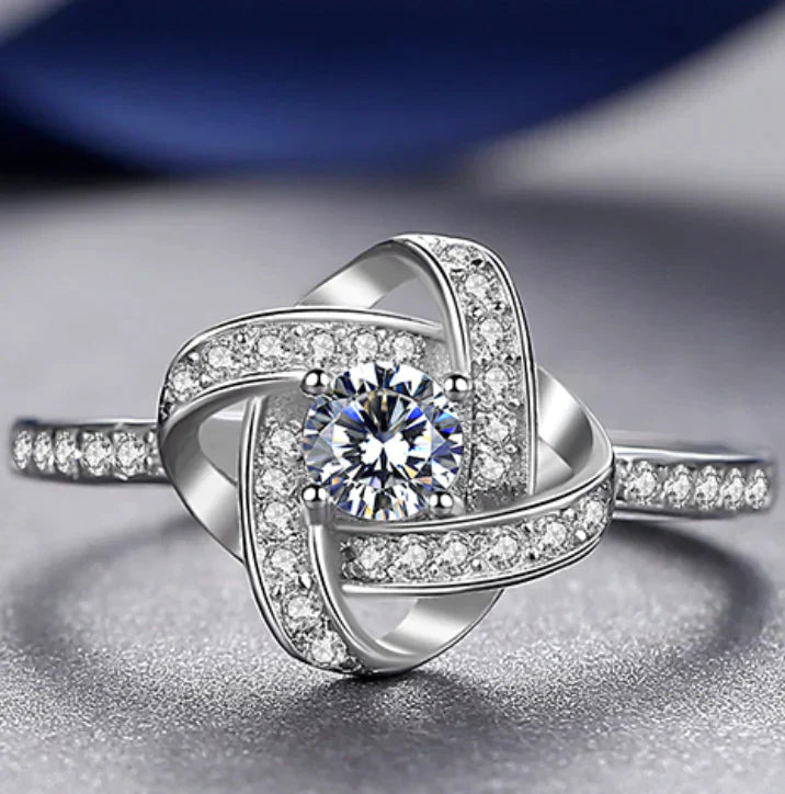 Pamper your loved one with our Enchanting Love Knot Ring - the Perfect Gift!