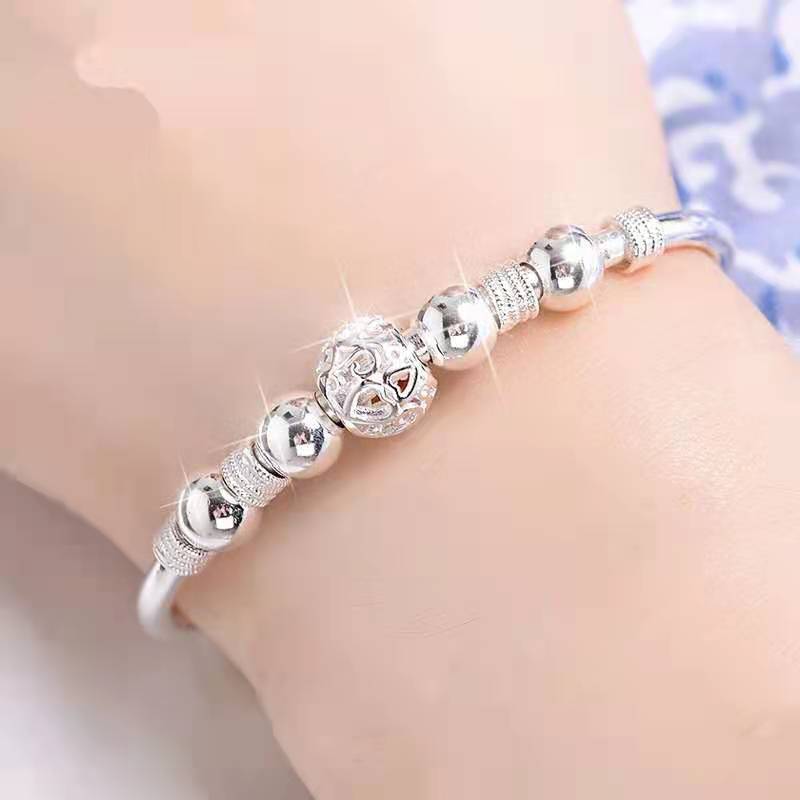 Stylish Bracelet with Captivating Silver Lucky Beads