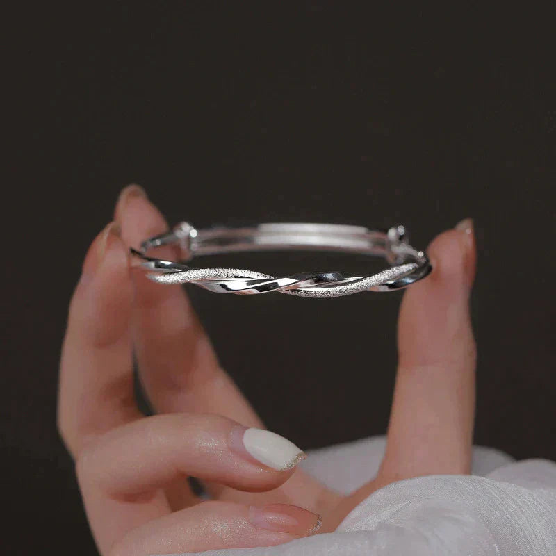 Elegant twisted silver bracelet 