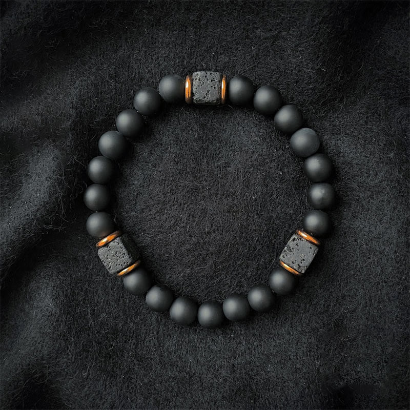 Aurelia Zwart Onyx and Lavasteen Kubus Balance Bracelet 