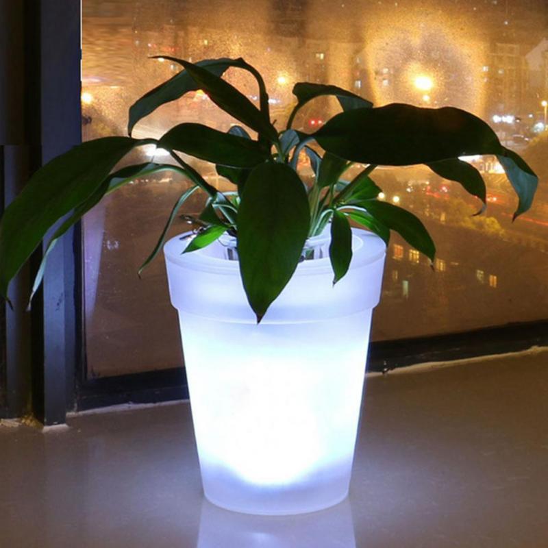 SolarGlow - Sustainable Flower Pot with Magical Lighting