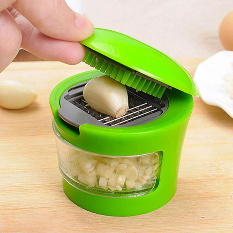 Garlic Press Pro - Compact garlic press with container