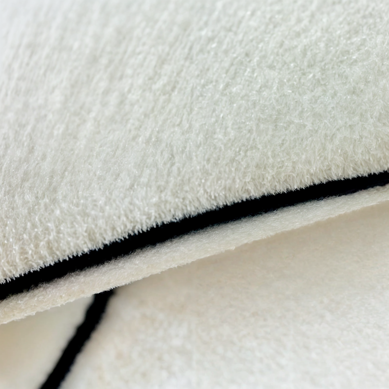 Woolly Waves – Minimalist Round Wool Rug with a Unique Shape