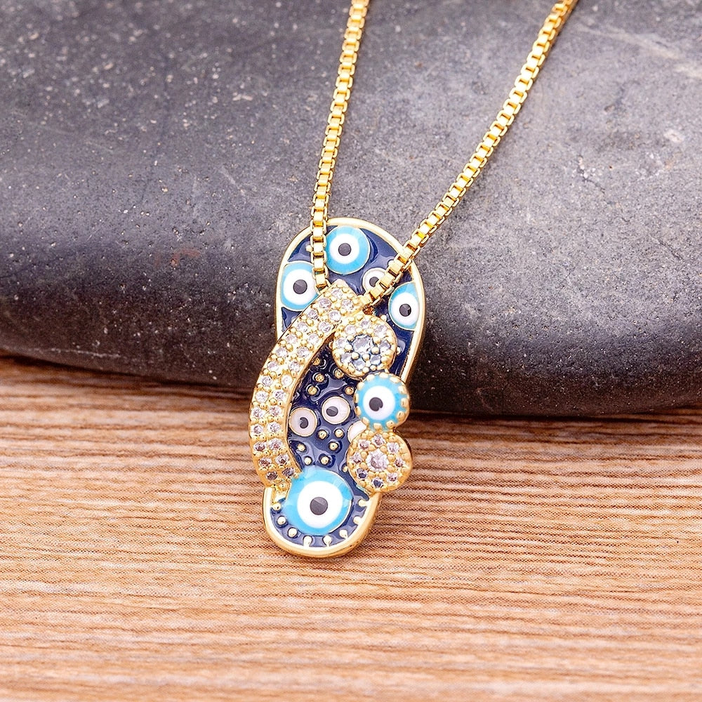 Tempting Gold Necklace with Flip Flop Pendant and Protective Evil Eye - Selma 
