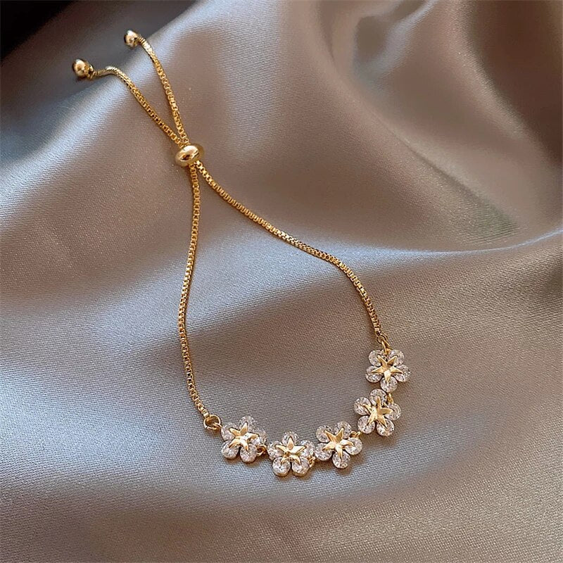 Elegant Golden Flower Bracelet with Sparkling Crystals - Rosalind