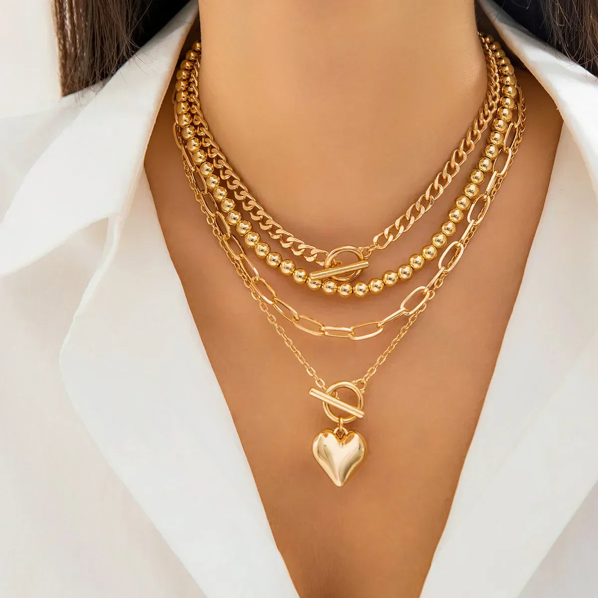 HeartGleam Necklace Set – Elegant Gold Heart Pendants