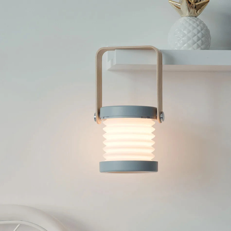 CompactGlow – Elegant Foldable LED Desk Lamp for Home and Travel
