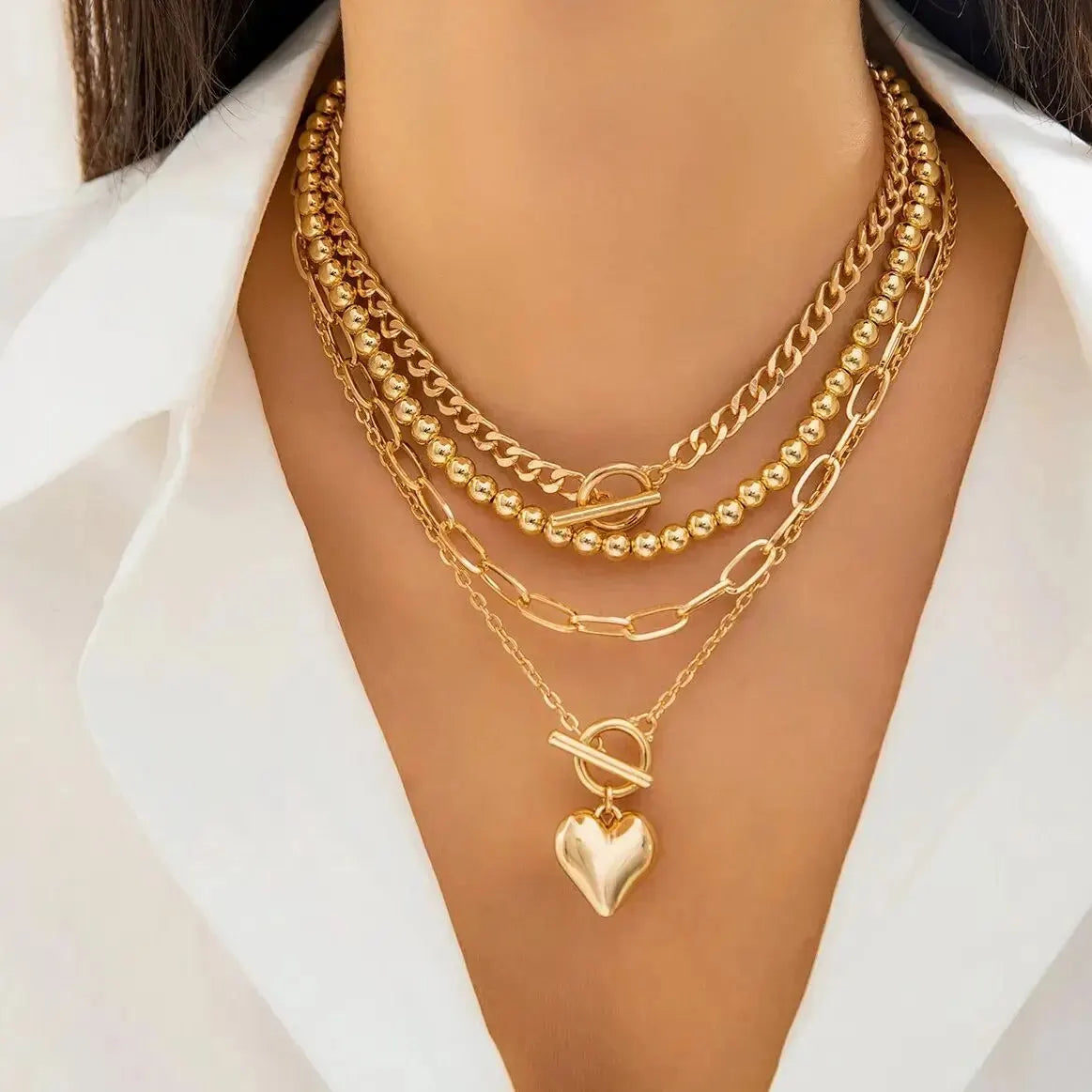 HeartGleam Necklace Set – Elegant Gold Heart Pendants