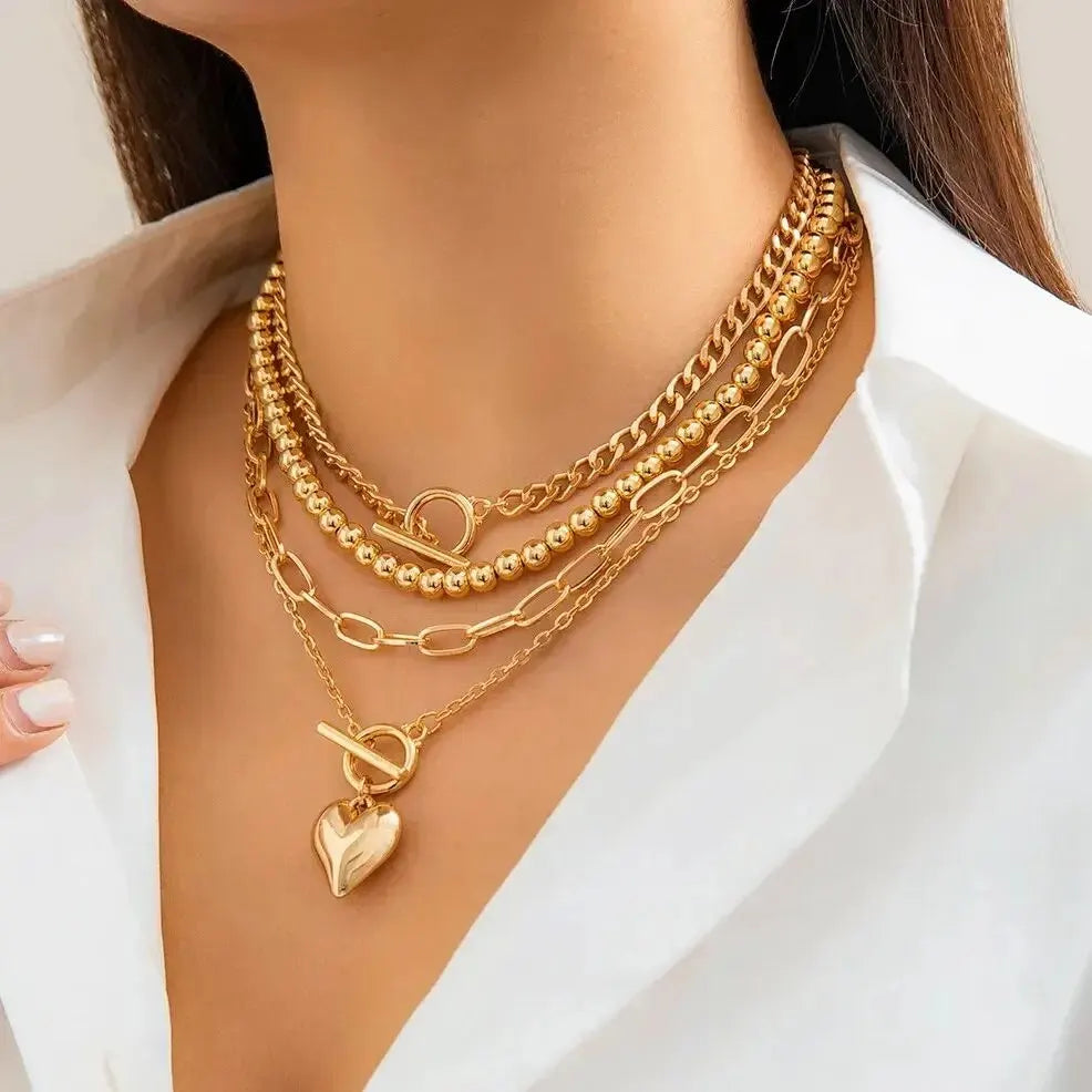 HeartGleam Necklace Set – Elegant Gold Heart Pendants